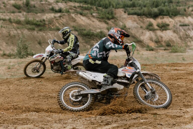 Two riders battling on an off-road track