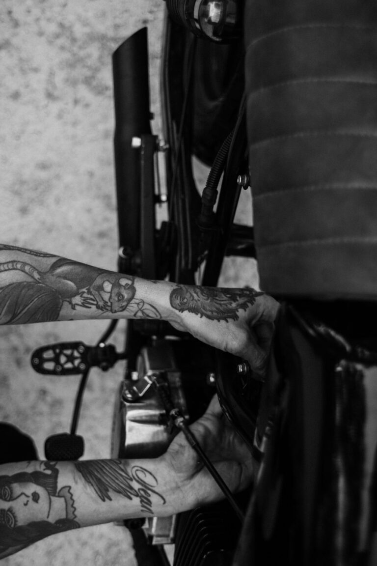 Overhead view of a rider repairing a bike