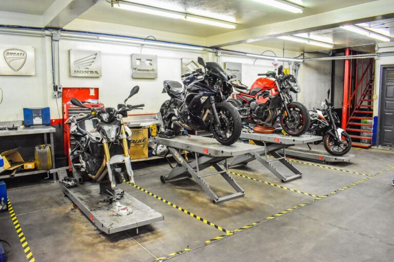 Motorcycle repair shop with bikes on stands